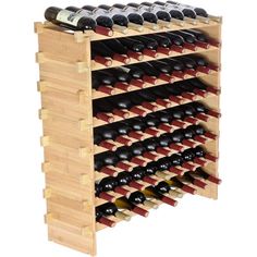 a wooden wine rack filled with lots of bottles