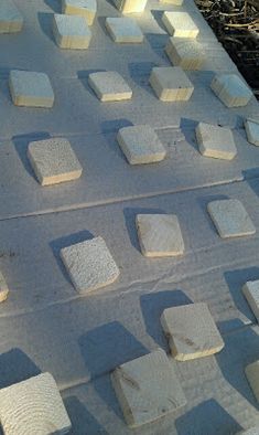 several blocks of cement sitting on top of each other