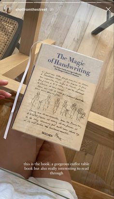 someone is reading a book about the magic of handwriting