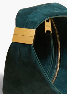 A slouchy zip-top hobo bag on a compact scale. With integrated strap that fastens with a magnetic jewelry clasp for easy access to interior. Leather Outerwear, Magnetic Jewelry, Jewelry Clasps, Denim Shoes, Boot Pumps, Purple Bags, Green Suede, Small Handbags, 6 D