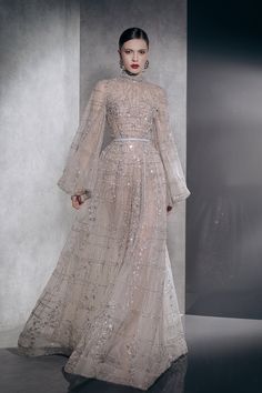 Long sleeves fully beaded dress with train – HerTrove Gaun Tulle, Ziad Nakad, Neckline Embroidery, Embroidery Tulle, Outfit Cardigan, Gaun Fashion, Sleeve Gown, Long Sleeve Gown, Winter Mode