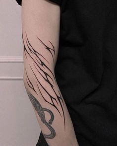 a person with a tattoo on their arm