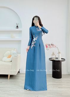 🌻Material: Lụa vân gỗ 🌻Stretchy level: 2/10 🌻 The measurement of this ao dai (long dress) is in Vietnamese size (American size tends to be bigger for the same size). Please LOOK AT THE SIZE CHART CAREFULLY BEFORE ORDERING. There might have some chalk writings on the fabric due to making process. These marks can be washed away easily. 🌻🌻No returns or exchanges Buyer can contact seller about any issues with an order. 🌸 Follow us Facebook/aodaiemily www.aodaiemily.com 💜 Thank you very much💜 Vietnamese Dress Ao Dai, Fitted Long Sleeve Cheongsam With Floral Embroidery, Elegant Blue Floor-length Ao Dai, Elegant Long Sleeve Cheongsam With Floral Embroidery, Embroidered Long Sleeve Fitted Cheongsam, Fitted Long Sleeve Embroidered Cheongsam, Embroidered Fitted Long Sleeve Cheongsam, Fitted Long Embroidered Dress, Long Fitted Embroidered Dress