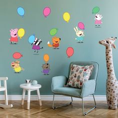 a child's room with balloons and animals on the wall