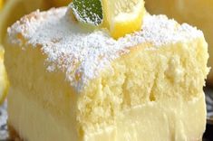 a slice of lemon cake with powdered sugar on top