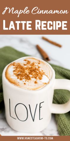 a cup of hot chocolate with cinnamon on top and the words maple cinnamon latte recipe above it