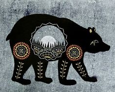 a black bear with an intricate design on it's face and back paws, standing in front of a gray background