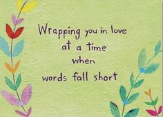 a painting with words written on it that says wrapping you in love at a time when words fall short