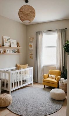 a baby's room with a crib, chair and rug