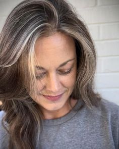 I love seeing how many women are embracing their gray hair and sharing their journeys on social media. As women, we tend to have unrealistic expectations for ourselves, in all areas of our lives, and this carries over into our hair. But, the fact is, pretty much all of us will go gray at some Going Grey Naturally With Dark Hair, Covering Gray Hair Light Brown, Grey Hair Growing Out From Brown, How To Let My Grey Hair Grow Out, Women’s Salt And Pepper Hair, Gray Transition, Gray Blending, Grey Blending, Grey Hair Journey