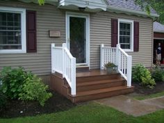 a house with steps leading up to the front door