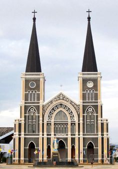 an old church with two steeples on it