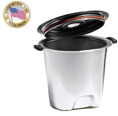 a white and black trash can with lid