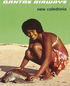 a woman kneeling down next to a turtle on top of a sandy beach with the caption santa's airways new caledona