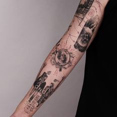 a person with a black and white tattoo on their arm