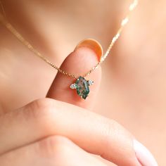 Moss agate & diamond gold necklace with a unique hexagon-cut green mossy gemstone and accent round diamonds.Click for matching ring:
https://www.capucinne.com/collections/moss-agate/products/moss-agate-ring-hexagon-agate-ring-0136Matching bracelet:https://www.capucinne.com/collections/gemstone-bracelet/products/hexagon-moss-agate-bracelet-unique-moss-agate-bracelet-14k-gold
We are the original jewelry designers to use moss agate and create geometric moss agate one-of-a-kind jewelry. Please bewar Diamond Gold Necklace, Moss Necklace, Moss Agate Necklace, Moss Agate Bracelet, Ring Hexagon, Jewelry Closet, Moss Agate Jewelry, Hexagonal Ring, Necklace With Diamonds