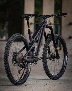 a bike parked in front of a building