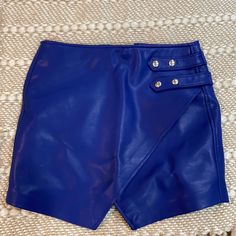 Asymmetrical Blue Leather Skirt-Never Worn Chic Blue Shorts For Night Out, Chic Blue Skort For Night Out, Blue Skort For Spring Night Out, Blue Skort For Night Out In Spring, Blue Bottoms With Side Zipper For Spring, High Waist Blue Mini Skirt For Night Out, Chic Blue Shorts For Party, Chic Blue Party Skort, Chic Party Shorts In Blue