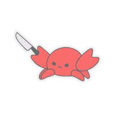 a red crab with a knife sticking out of it