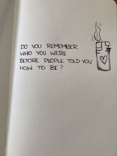 an open book with writing on it that says do you remember who you were before people told you how to be?