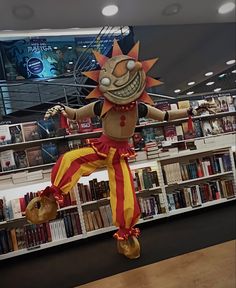 an inflatable clown is standing on one leg