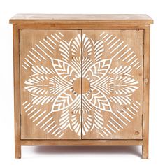 a wooden cabinet with an intricate design on it