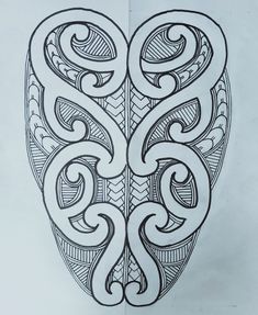 a drawing of an intricate design on paper