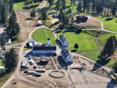 an aerial view of a large farm house