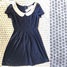 Blue Mini Dress With White Collar And Zip On Back. Nice For Work Or Party. Size Medium. Purchased From Modcloth Cute Fitted Navy Dress, Navy Fitted Cute Dress, Cute Navy Short Sleeve Dress, Fitted Party Dress With Peter Pan Collar, Fitted Summer Dress With Peter Pan Collar, Cute Blue Dress With Peter Pan Collar, Navy Cotton Mini Length Dresses, Navy Fitted Cotton Mini Dress, Navy Short Sleeve Lined Dress