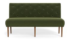 an upholstered green couch with wooden legs