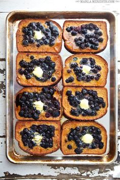 some blueberry french toast with butter on top in a baking pan, and the text reads tastemade