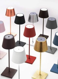 many different colored lamps are on the floor