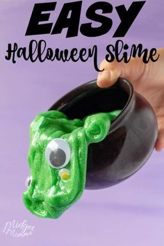 a hand holding a black pot with green slime in it and the words easy halloween slime