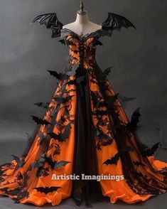 an orange and black dress with bats on it