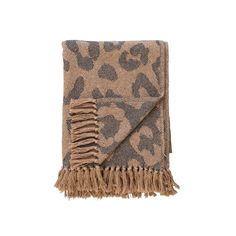 a leopard print blanket with fringes on it