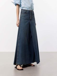 MO&Co. Women's A-line Maxi Denim Skirt This denim skirt features an A-line maxi silhouette, a flattering and versatile style that falls gently away from the body. Crafted from premium cotton, this skirt features a pleated and raw hem design that adds a unique and trendy touch, while the deep blue hue gives it a classic and timeless look. Pair with a cute top or tucked-in blouse for a chic outfit. Features : - Mid waist A-line maxi silhouette- Classic five pocket design- Pleated and raw hem desig 2024 Wardrobe, Maxi Denim Skirt, Denim Maxi Skirt, Chic Outfit, Mesh Bag, Cute Top, Blue Hues, Versatile Style, Cute Tops