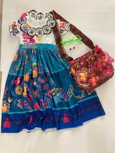 Encanto Mirabel Costume dress  Size:  6-7  - Length 35.83" (91 cm)  - Chest 24.41" (62 cm)  - Waist 20.87" (53 cm Includes: Dress, handbag, earings and glasses Ships same business day Mirabel Costume, Mirabel Dress, Cathedral City, Inspired Dress, Costume Dress, Adult Costumes, Piece Dress, Kids Costumes, High Waisted Skirt