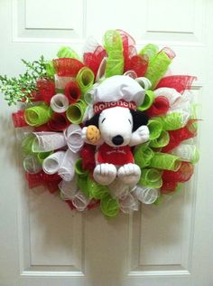 a wreath that has a snoopy dog on it