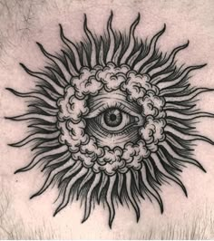 a man's chest with an all seeing eye tattoo on it