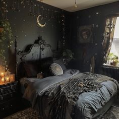 a bed room with a neatly made bed and two candles on the nightstands next to it