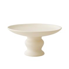 a white bowl sitting on top of a table