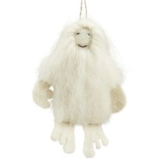 a white stuffed animal hanging from a string