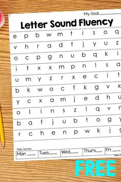 a printable letter sound fluncy worksheet on a wooden table with pencils