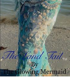 the sand tail by the glowing mermaid