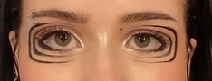 All Around Eyeliner, Beauty Marks On Face Makeup, Brown And Yellow Makeup, Dark Circles Makeup Aesthetic, Swirly Makeup Look, Bald Makeup Looks, Spiral Eye Makeup, Eyebrowless Makeup, 20s Makeup Look