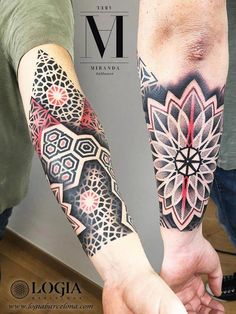 two people holding hands with tattoos on their arms and arm, both showing different designs