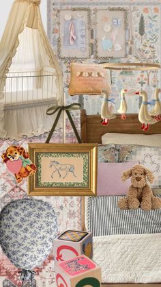 there is a teddy bear sitting on the bed in front of many pictures and toys