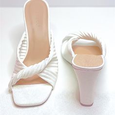 - 4” Heel - Padded Insole For Comfort - Lightweight - Twisted Band For A Trendy Look - Leather Material - Fits True To Size - Also Available In White And Nude White Open Heel Wedge Sandals With Padded Heel, White Wedge Heel Sandals With Padded Heel, White Synthetic Heels With Heel Loop, Chic White Slip-on Wedge Sandals, White Wedge Sandals With 4-inch Heel For Summer, White Synthetic High Heel Wedge Sandals, White Wedge Sandals With Padded Heel, White Wedge Sandals With Wrapped Heel And Open Toe, White Padded Wedge Heels