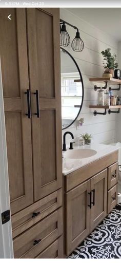 the bathroom is clean and ready to be used as a storage area for towels or other items