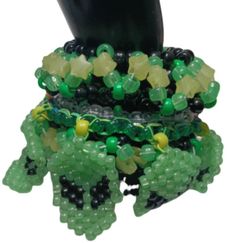 8 Green Glow in the Dark Alien Faces Rotate Around this Green UFO Kandi Cuffs – The Kandi Bazaar Kandi Rotating Cuff, Kandi Star Cuff, Alien Kandi, Edc Bracelets, Alien Faces, Rave Cuffs Kandi, Scene Kandi Cuff, Epic Kandi Cuff, Rave Bracelets